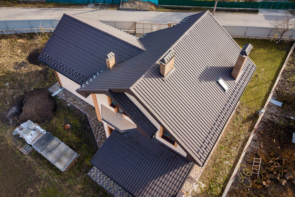 metal roofing okeechobee fl-aerial view of brown standing seam metal roof